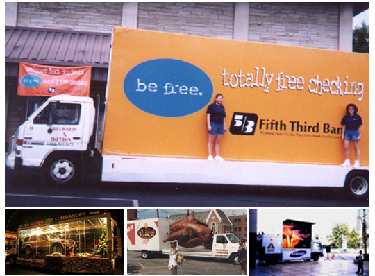 Large truck with advertising on side